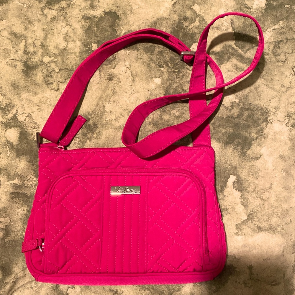 Hot fuchsia pink Vera Bradley bag with lots of pockets